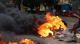 Key South African trade route to Mozambique shut as protests flare