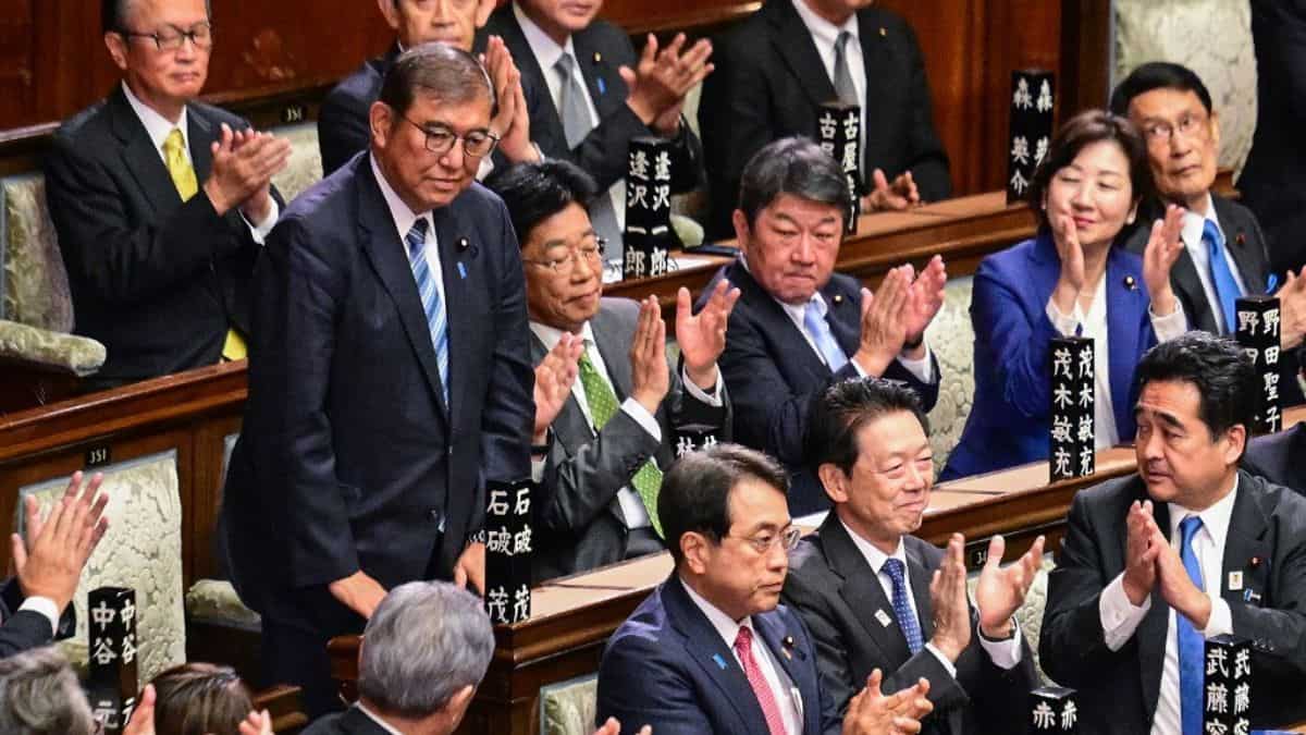 Japan's PM Shigeru Ishiba wins run-off vote in parliament to stay in post despite election setback