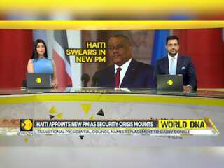 Haiti Swears In New PM As Gunfire At Airport Hits Flight From US