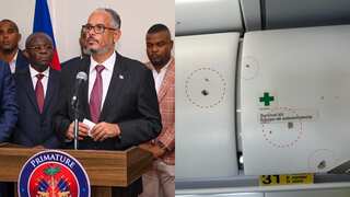 Haiti's new PM sworn in as passenger jet comes under fire in Port-au-Prince