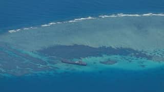 During meeting with Xi, Japan PM expresses concerns over South China Sea situation
