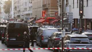 Hostage crisis near Paris resolved after police detain knife-wielding man