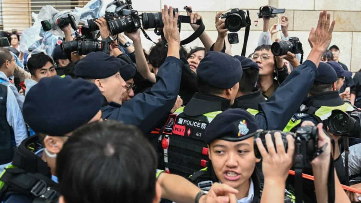 Hong Kong court sentences Benny Tai, 44 others in landmark security law  case - World News