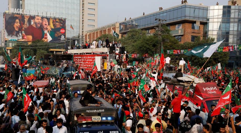 Imran Khan’s PTI tones down planned Nov 24 protests as authorities lock down Islamabad