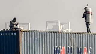 Pakistan protests: Viral video shows man pushed off 25ft-tall container tower