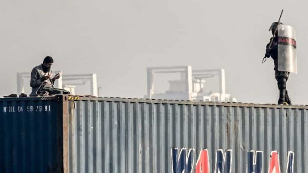 Pakistan protests: Viral video shows man pushed off 25ft-tall container tower