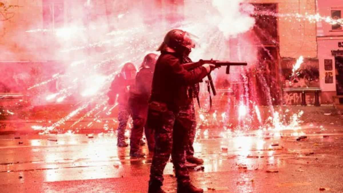 Demonstrators launch fireworks at police in Georgia as protests enter fourth day