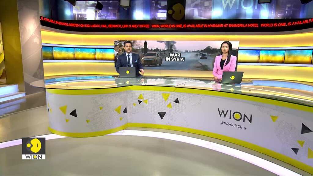 Syria Rebels: Iran President Pezeshkian Vows To Support Assad Government