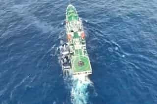 Philippines says China Coast Guard fired water cannon, 'sideswiped' govt vessel