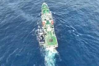 Philippines says China Coast Guard fired water cannon, 'sideswiped' govt vessel