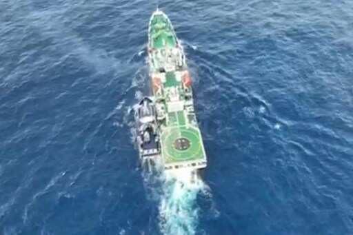 Philippines says China Coast Guard fired water cannon, 'sideswiped' govt vessel