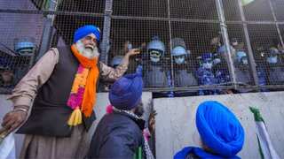 'Delhi Chalo' protest: Farmers halt march after police use tear gas shells, injuring many protesters