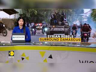 Syrian Rebels Captures Syria's Capital, Trump Says 'US Should Not Get Involved'