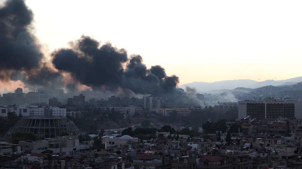 US conducts airstrikes on ISIS camps in Syria as Biden calls end of Assad regime an 'act of justice'