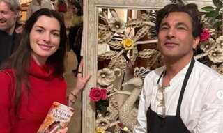 Hollywood actress Anne Hathaway visits chef Vikas Khanna's NY restaurant | In pics