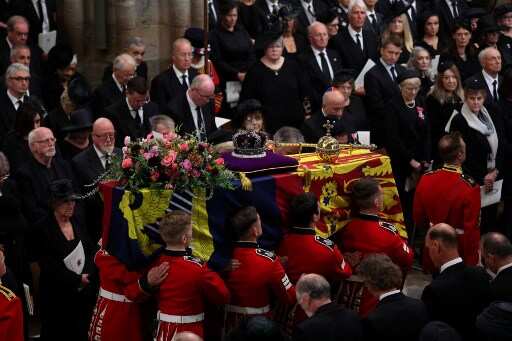 Queen Elizabeth II's coffin has arrived at Westminster Abbey for a grand state funeral attended by 2,000 guests including leaders from around the world