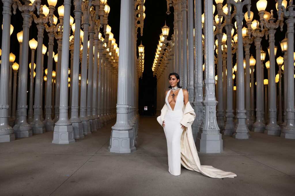 kim kardashian wearing princess diana dress Kim Kardashian Purchases Princess Diana's Famed Attallah Cross