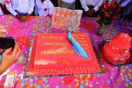 A birthday cake dedicated to detained civilian leader Aung San Suu Kyi as protesters take part in a demonstration against the military coup in Dawei.