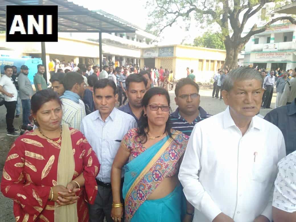 Former Uttarakhand Chief Minister Harish Rawat queues up to vote in Devalchaur, Haldwani. Voting on all 5 parliamentary constituencies in the state is underway.