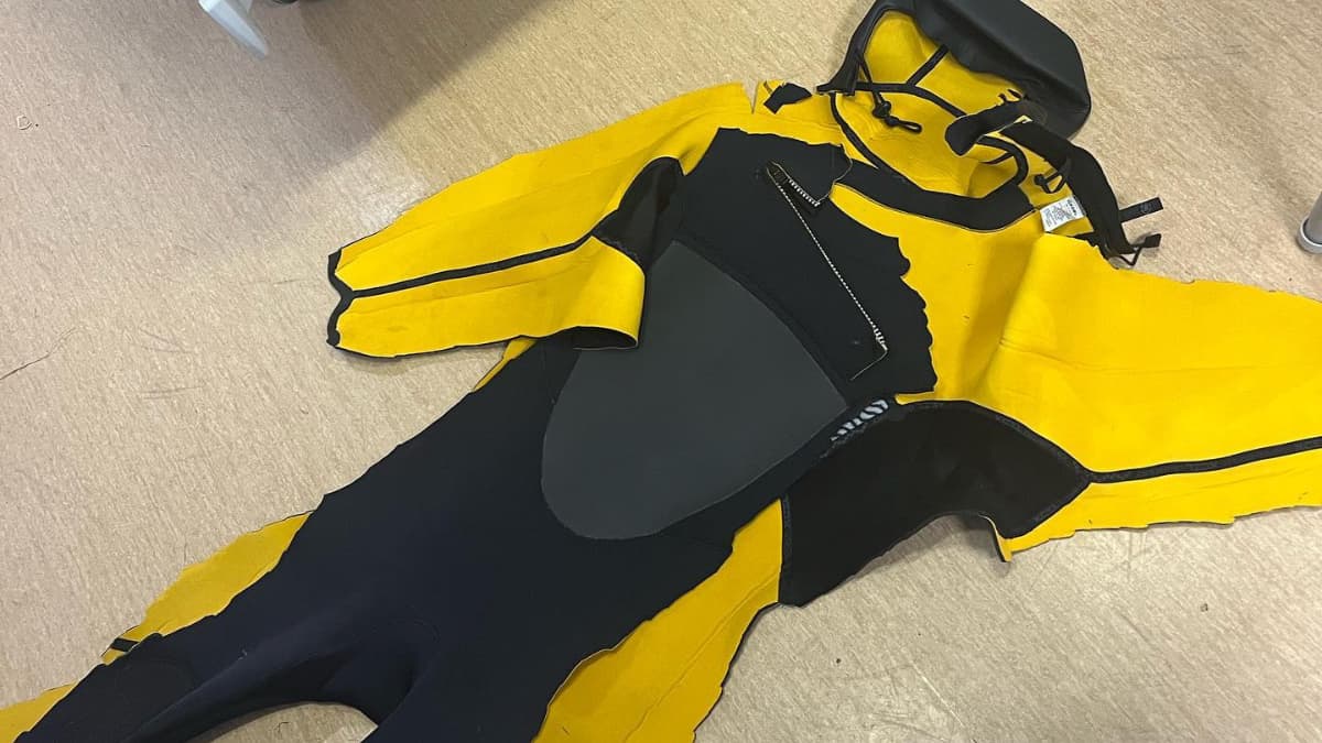 He also shared a picture of the now shredded wet suit he was wearing during the predicament.