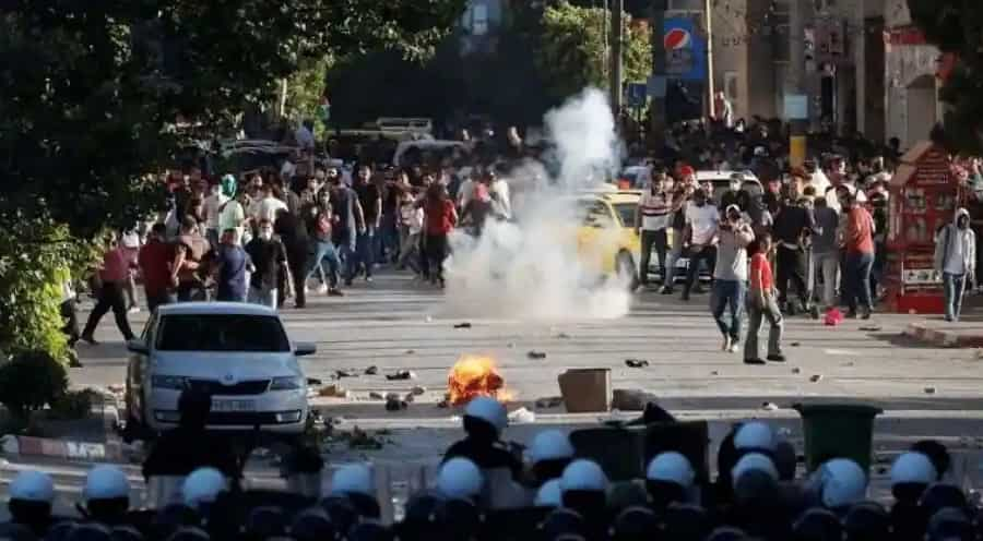 The Palestinian Authority (PA) on Saturday deployed security forces to confront protesters who took to the streets of Ramallah in the West Bank after one of President Mahmoud Abbas's biggest critics died in custody.