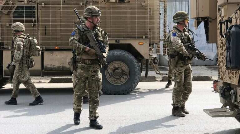 British soldiers with NATO-led Resolute Support Mission arrive at the site of an attack in Kabul