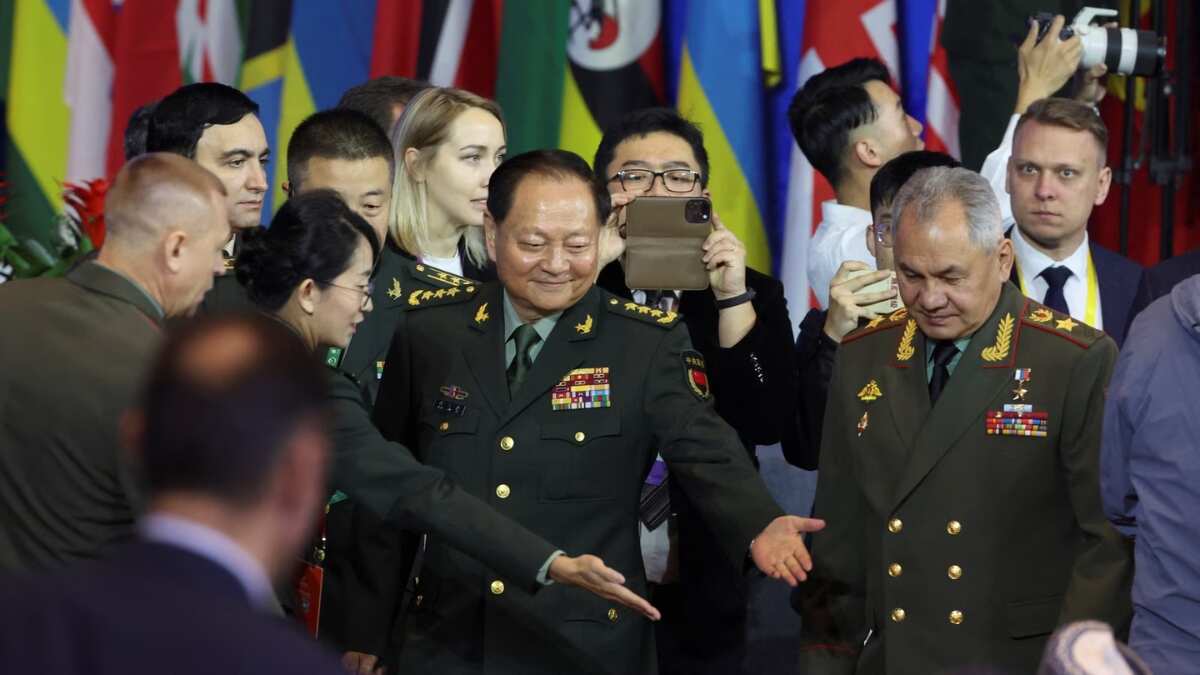 China's Central Military Commission Vice Chairman Zhang Youxia and Russian Defence Minister Sergei Shoigu arrive for the Beijing Xiangshan Forum on October 30 | Reuters