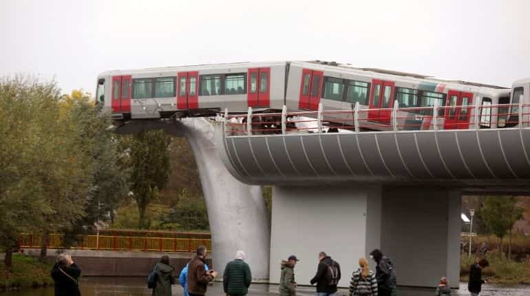 A general view of a metro that crashed through a stop block and landed on an artwork of a whale tail at De Akkers subway station in Spijkenisse, near Roterdam, Netherlands November 2, 2020.