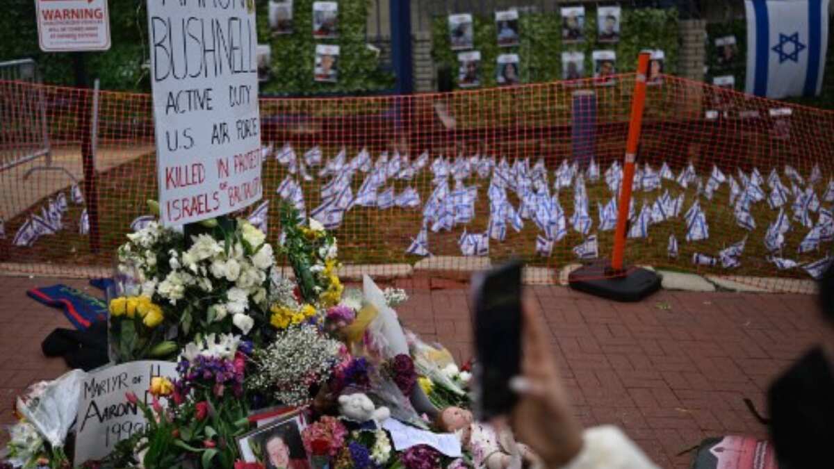A memorial to Aaron Bushnell is setup near the Israeli embassy in Washington, DC, on March 2, 2024 | AFP