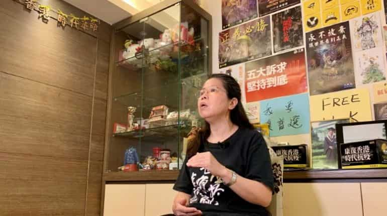 Office worker Daisy Lam speaks to Reuters about her experience in joining the annual June 4 candlelight vigil, at her living room in Hong Kong, China June 1, 2020