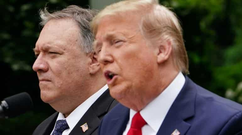 US President Donald Trump, with US Secretary of State Mike Pompeo, holds a press conference on China on May 29, 2020, in the Rose Garden of the White House in Washington, DC