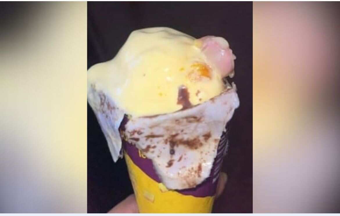 Ice cream cone with human finger 
