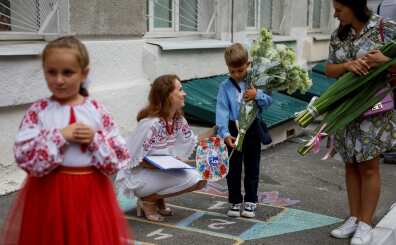 Ukrainian children head below ground at start of new school year