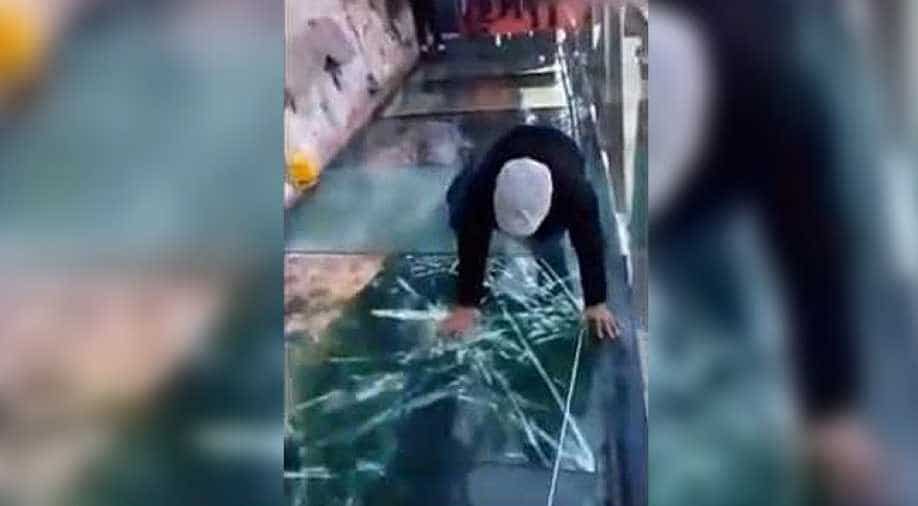 China's glass bridge cracks with every step, tourists stuck 3800 ft in