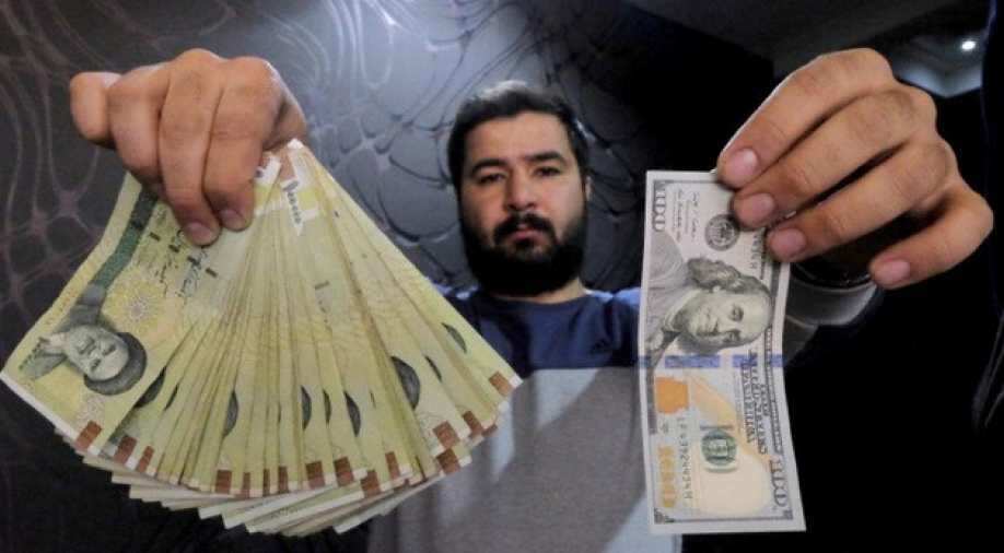 In first move since FX crackdown, Iran lowers rial vs dollar, World