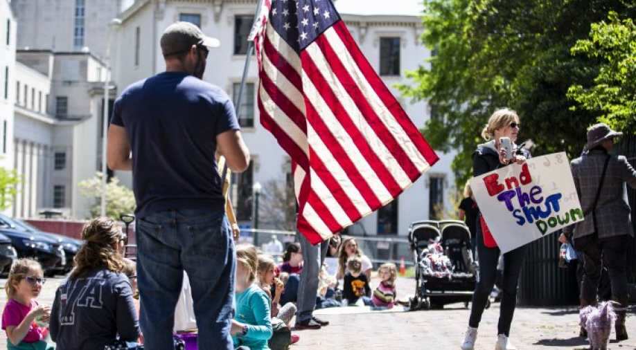 US Covid cases down 61% since peak, troops deployed for vaccine campaign - Vimarsana News