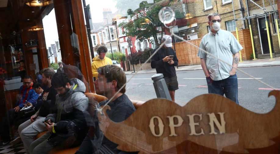 England takes its first steps towards normal life; pubs and