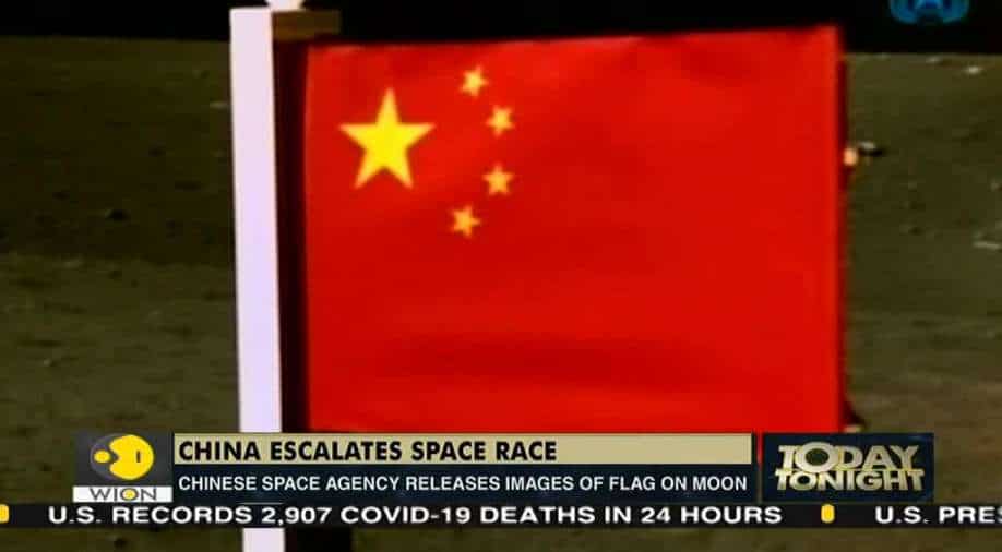 Today Tonight Chinese space agency releases images of flag on moon