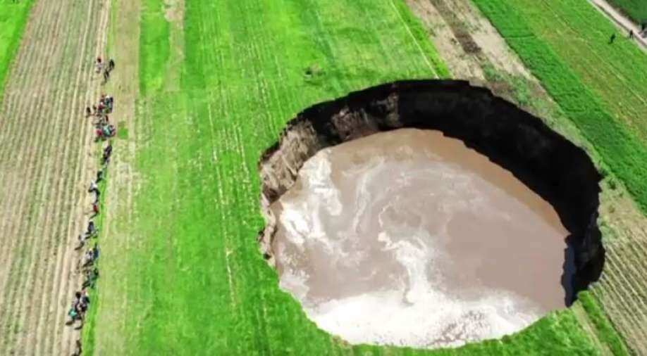Giant sinkhole in Mexican farm threatens to swallow a house World News