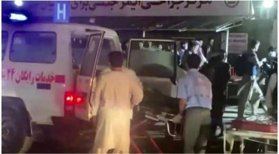 As it happened: Islamic State suicide bombers kill more than 60 people at Kabul airport