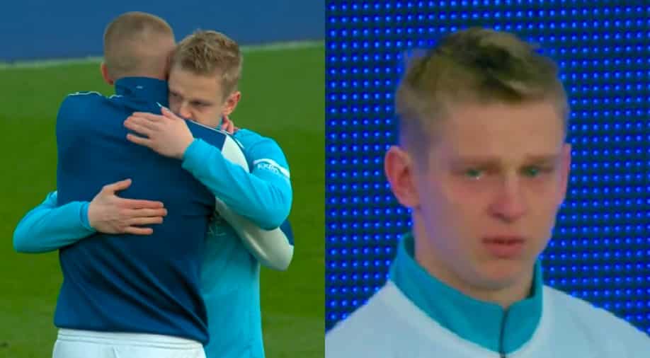Ukrainian duo Zinchenko and Mykolenko embrace each other as Man City