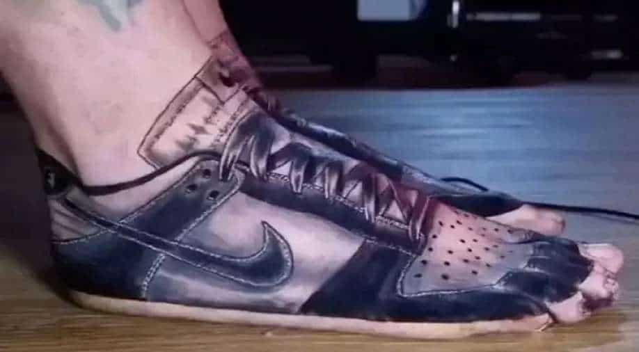 Nike shoe tattoo by Alberto Marzari | Photo 31655