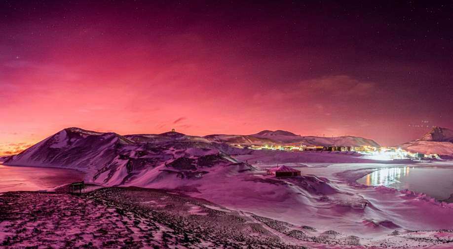 Antarctica dazzles in bright lilac, orange skies at night; seven months after Tonga volcano eruption - Vimarsana News