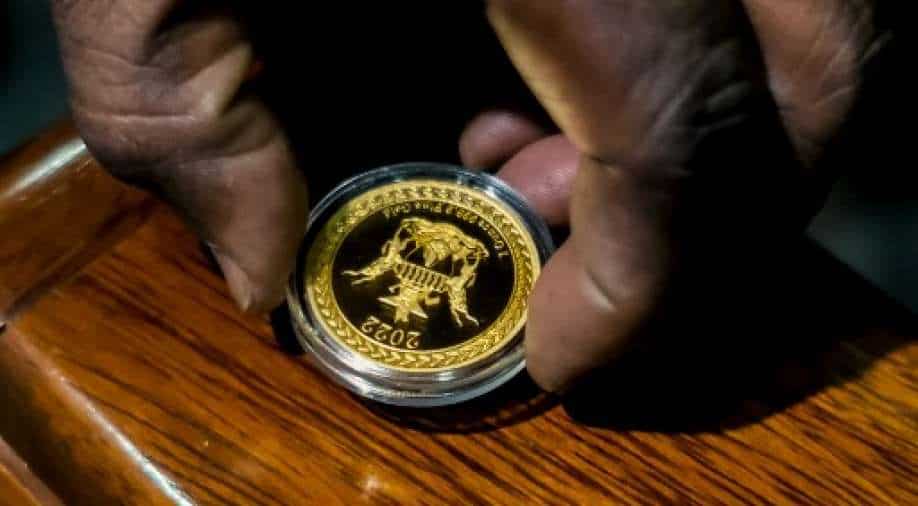 Zimbabwe debuts gold coins as legal tender to battle extreme inflation -  World News
