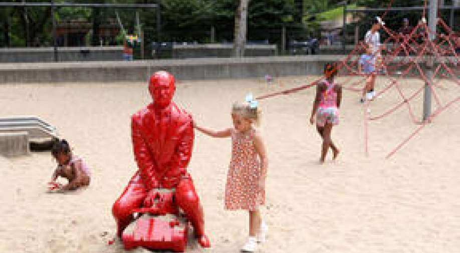 In pics Red Vladimir Putin statue appears in Central Park, leaves