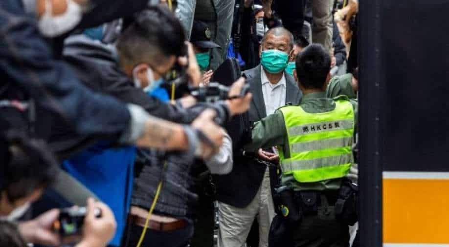 Jailed Hong Kong media tycoon moves court to stop police from accessing his phones - Vimarsana News