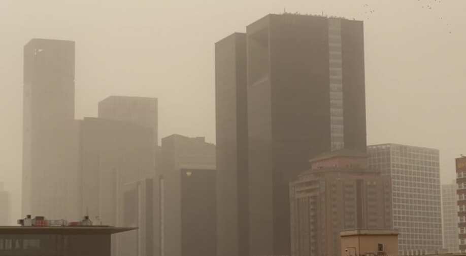 Sandstorm Hit In pics | China: Sandstorm hit Beijing witnesses dangerous pollution ...