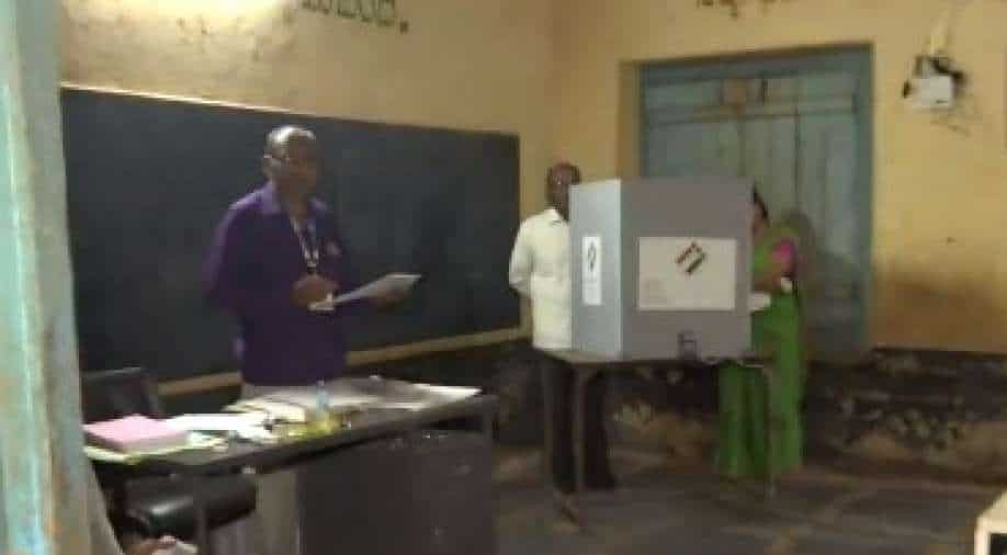 Karnataka Elections Exit Poll: Check whether its a win for BJP or Congress Karnataka Elections Exit Poll: Check whether its a win for BJP or Congress