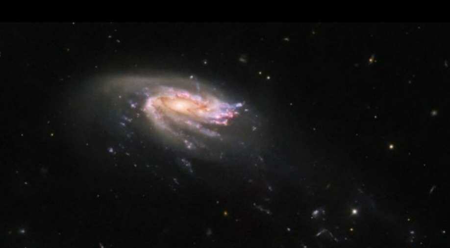 NASA's Hubble telescope clicks a beautiful 'jellyfish' galaxy Trending News