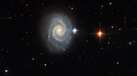 Hubble's spectacular capture shows distant spiral galaxy with 'forbidden' light